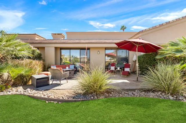 a view of a city with an ocean view