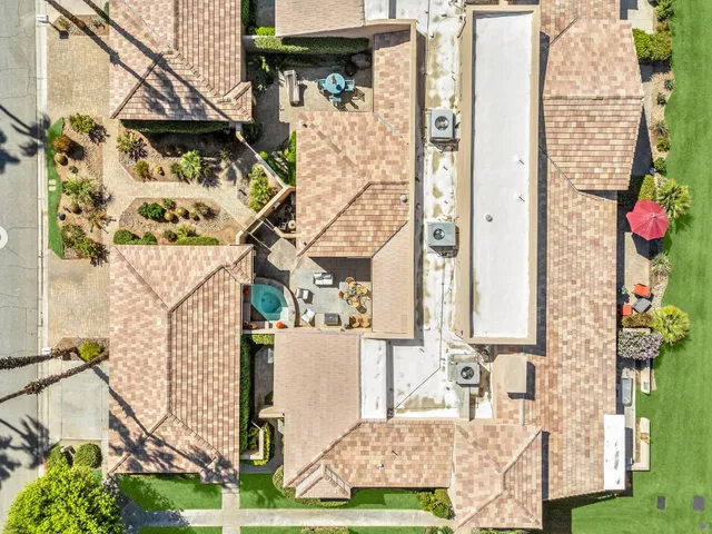 a view of a swimming pool and a yard