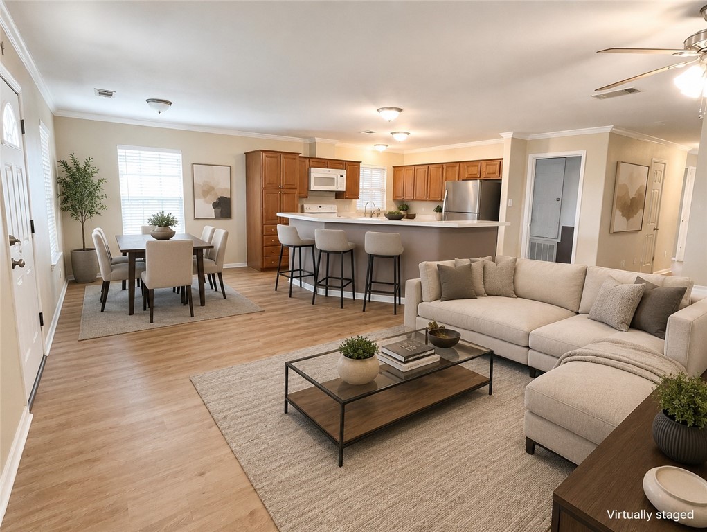 153 Boenig Road Woodsboro, TX 78393 - Photo 8 of 33 virtually staged
dining/living/kitchen