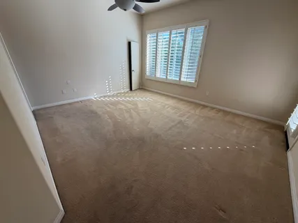 an empty room with windows