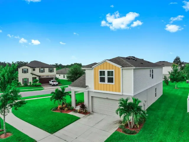 a outdoor living space with furniture and a potted plant