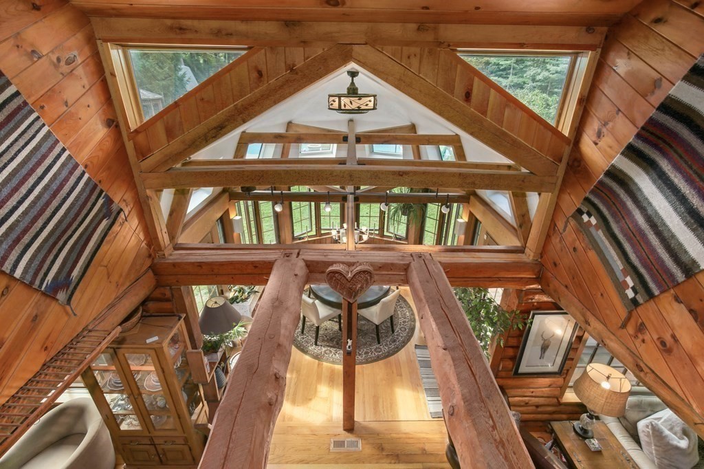 331 Edson Road Oakham, MA 01068 - Photo 23 of 40 a view of a chairs and table in the balcony
