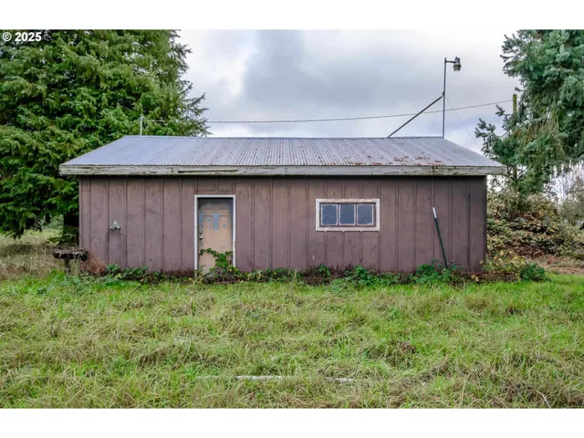 a backyard of a house with lots of green space