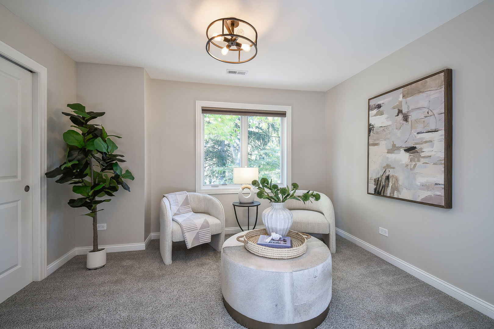 4733 Roslyn Road Downers Grove, IL 60515 - Photo 17 of 46 a living room with furniture and a potted plant