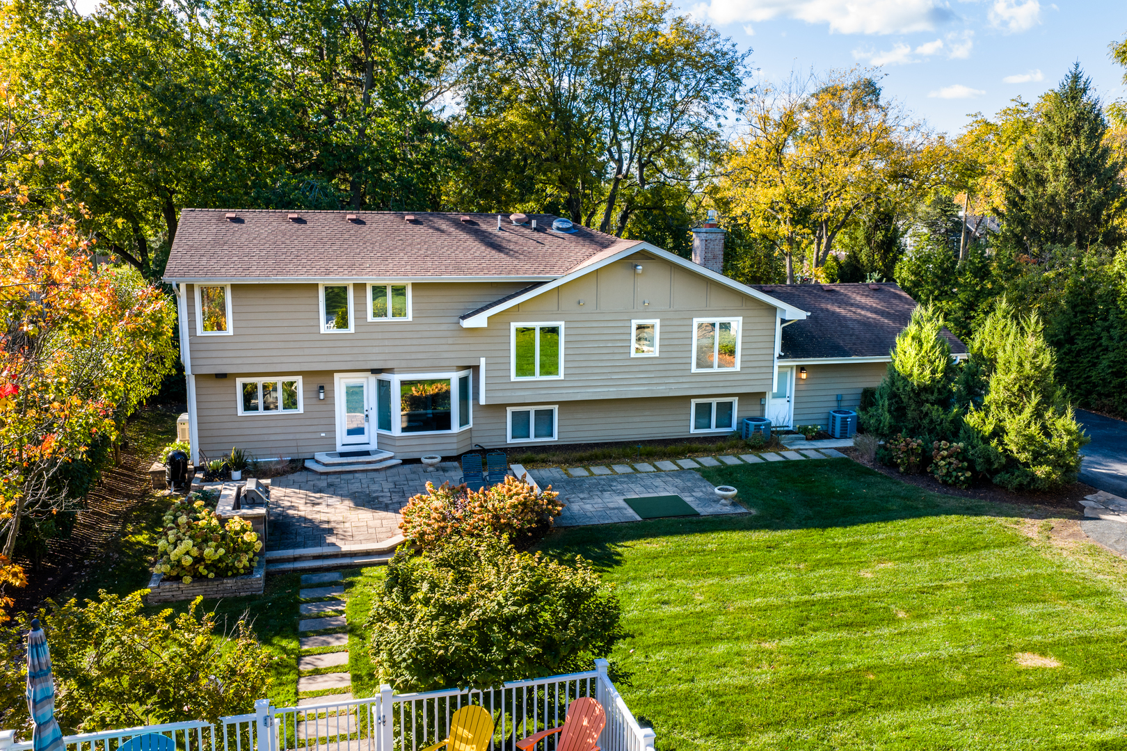 4733 Roslyn Road Downers Grove, IL 60515 - Photo 29 of 46 a front view of a house with garden