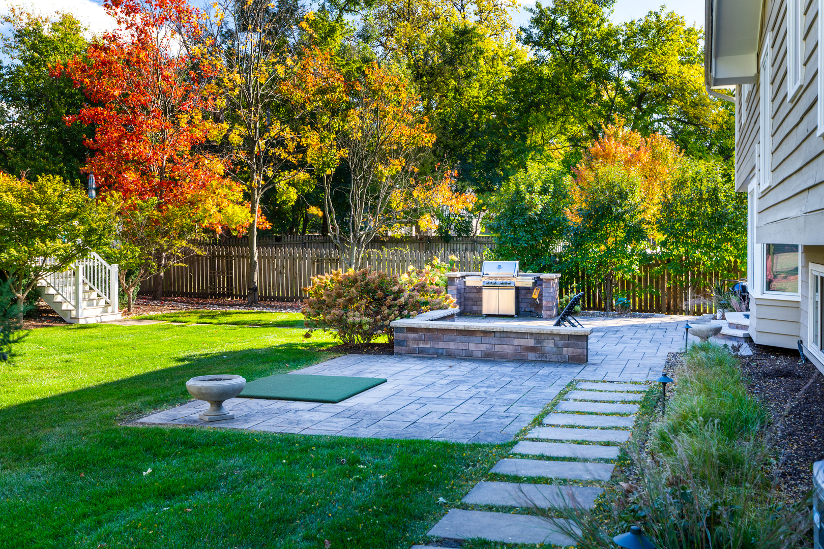 4733 Roslyn Road Downers Grove, IL 60515 - Photo 33 of 46 a front view of a house with garden and a garden