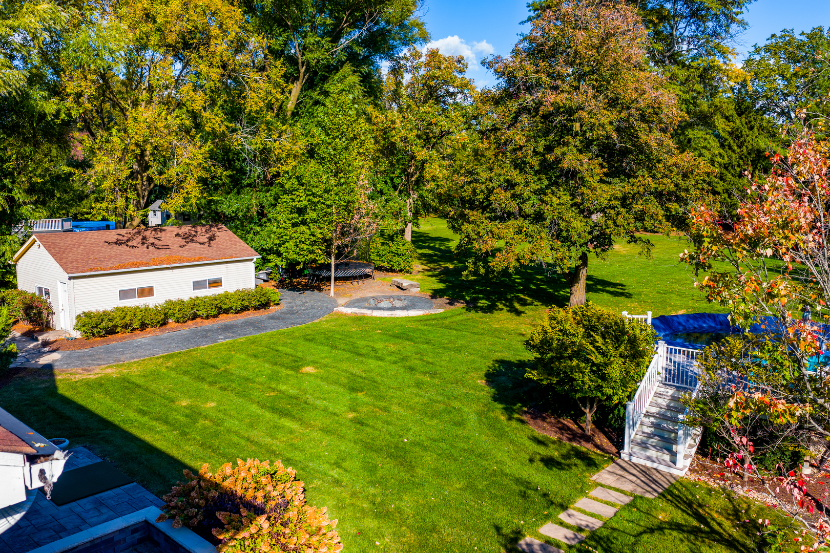 4733 Roslyn Road Downers Grove, IL 60515 - Photo 38 of 46 a green field with lots of flowers in it