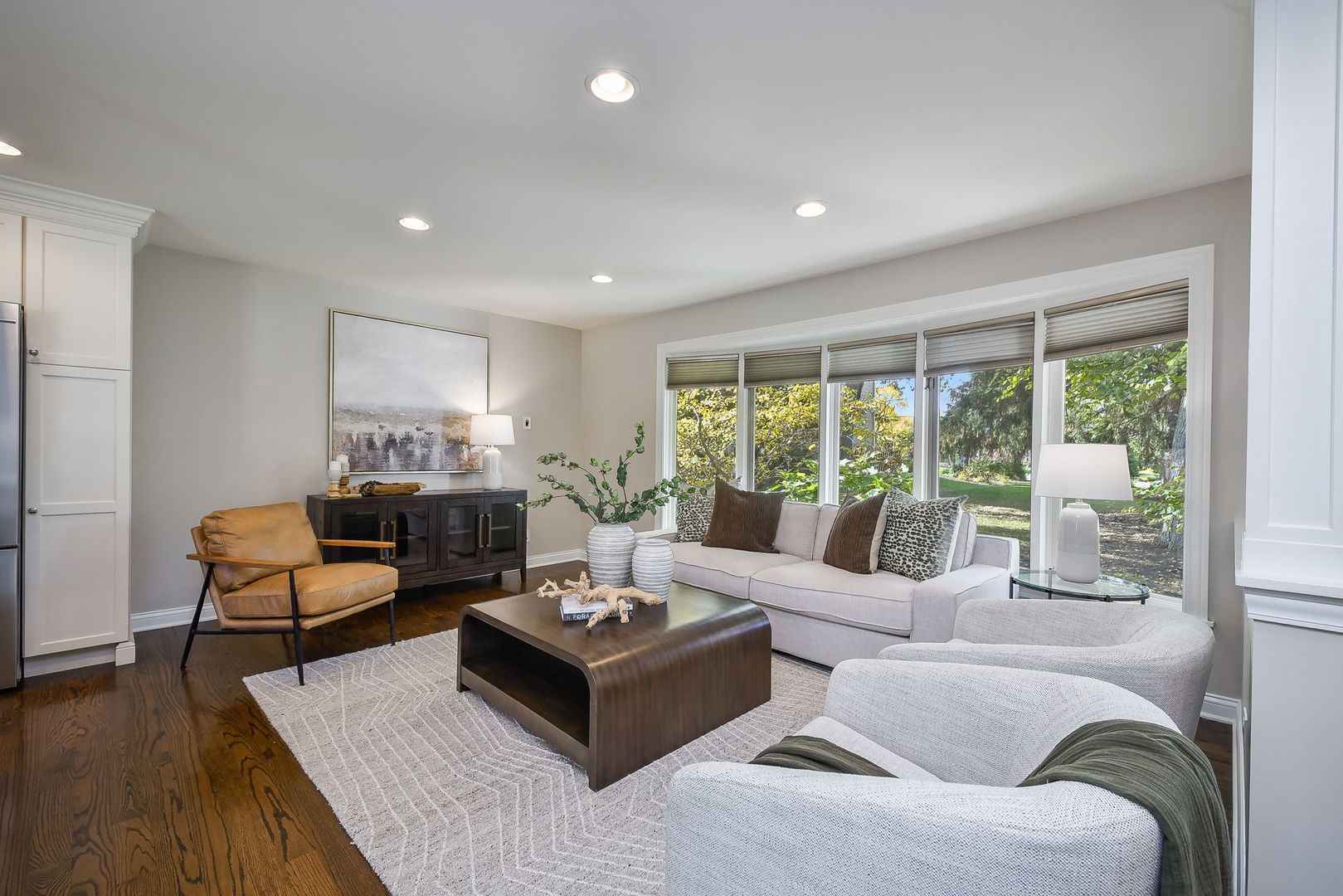 4733 Roslyn Road Downers Grove, IL 60515 - Photo 4 of 46 a living room with furniture and a large window