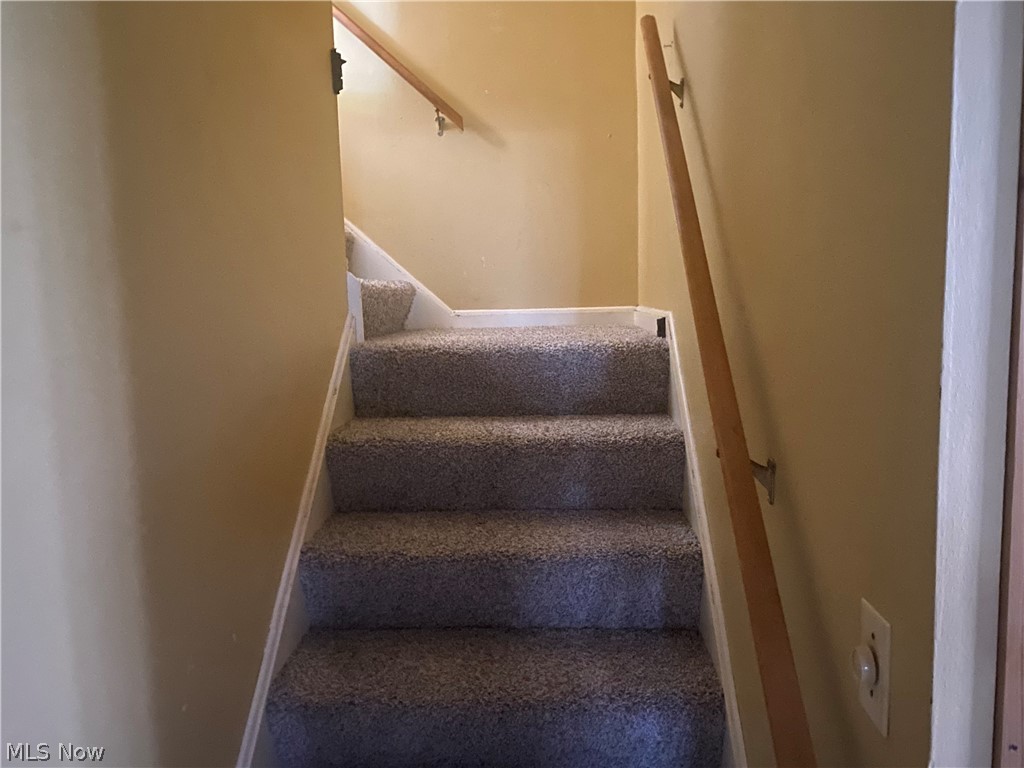 13005 Milo Road Cleveland, OH 44125 - Photo 22 of 33 Stairs featuring carpet