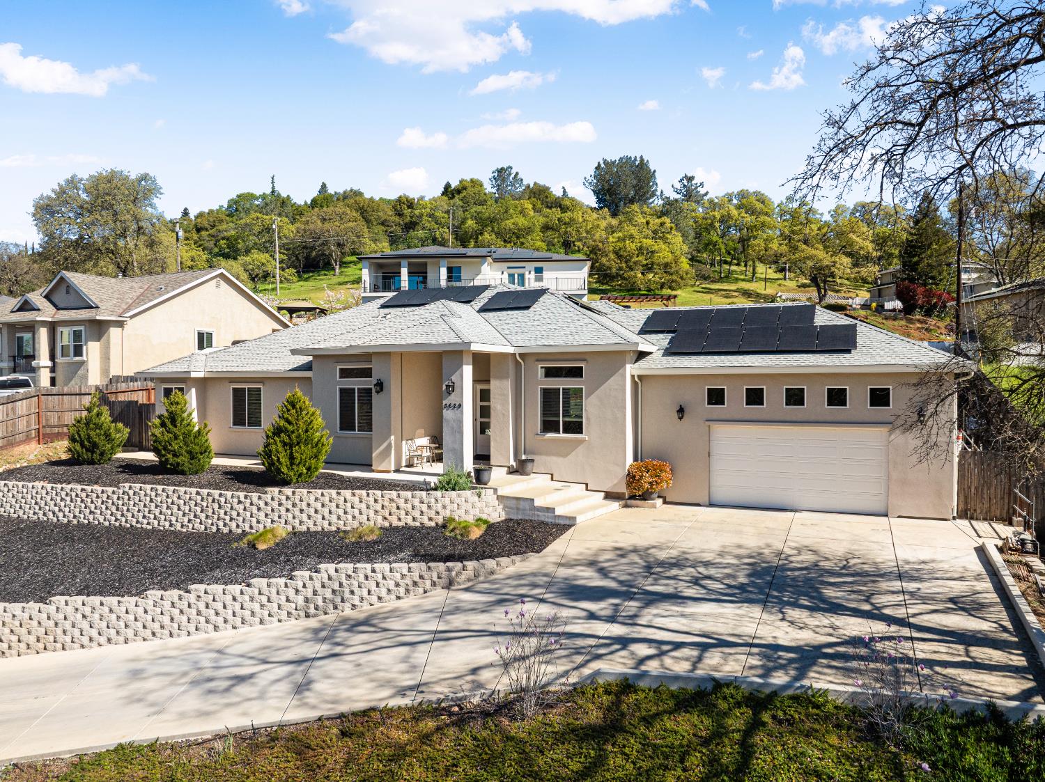 3629 Chelsea Road Cameron Park, CA 95682 - Photo 1 of 44 a front view of a house with a yard and potted plants