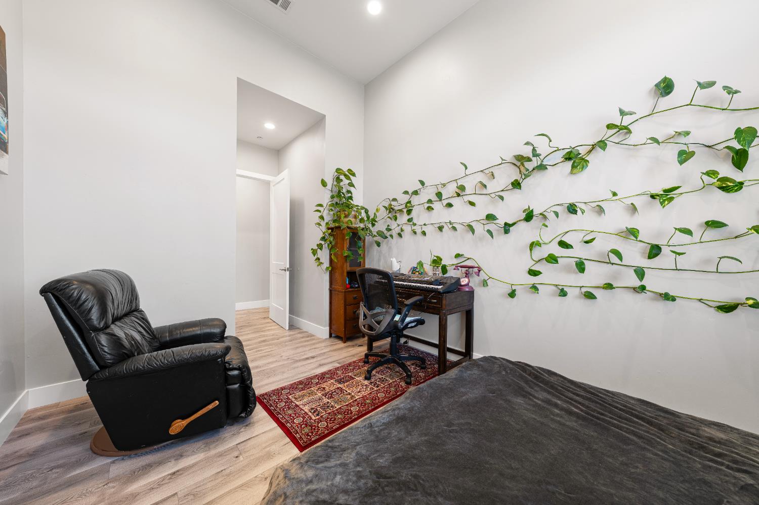 3629 Chelsea Road Cameron Park, CA 95682 - Photo 17 of 44 a living room with furniture and a potted plant