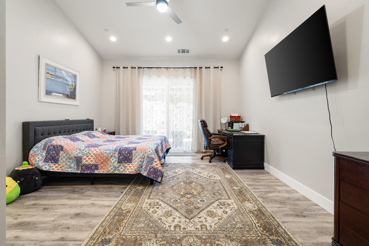 3629 Chelsea Road Cameron Park, CA 95682 - Photo 19 of 44 a bedroom with a bed and a flat screen tv