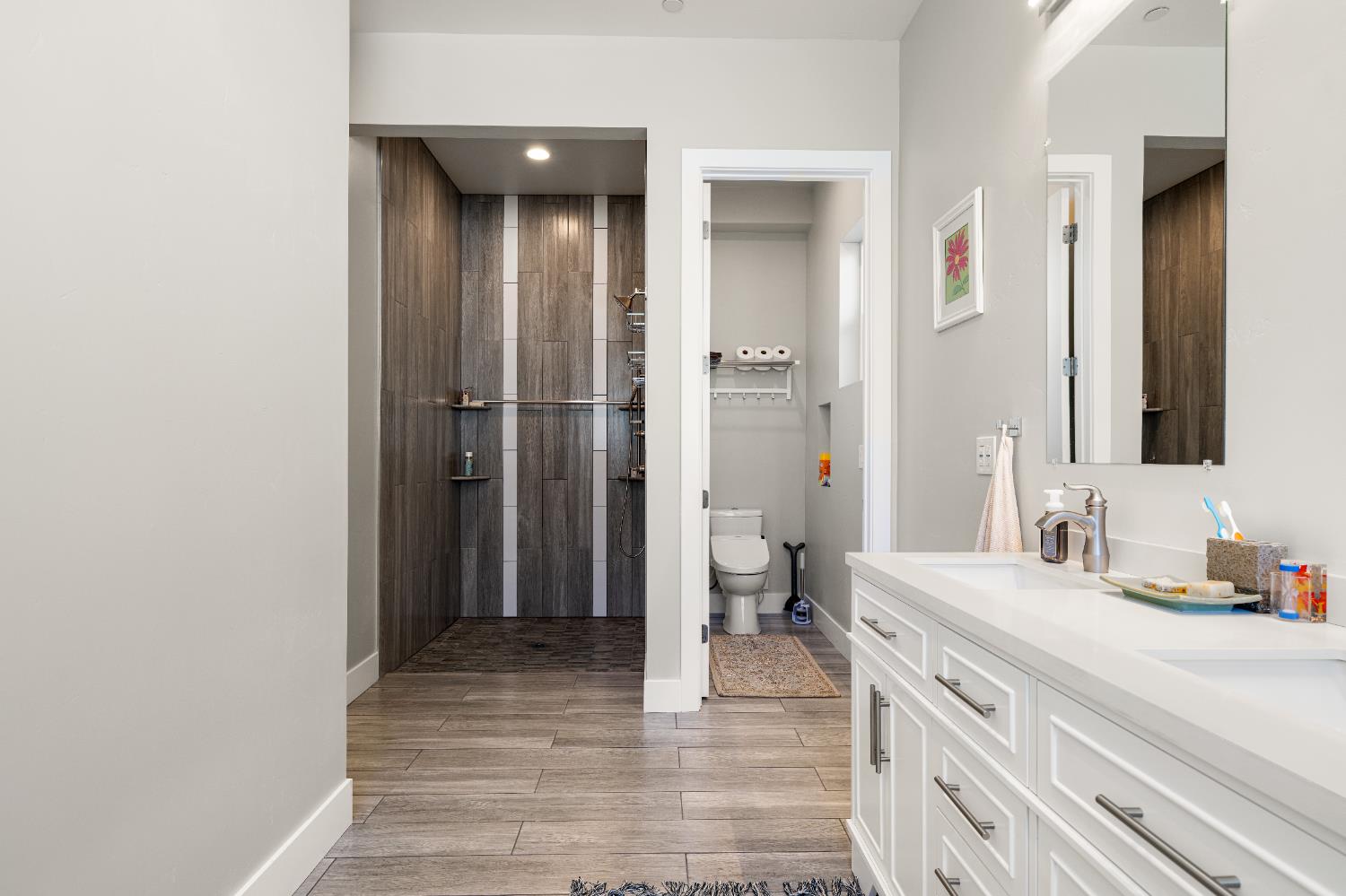 3629 Chelsea Road Cameron Park, CA 95682 - Photo 23 of 44 a bathroom with a sink and a mirror