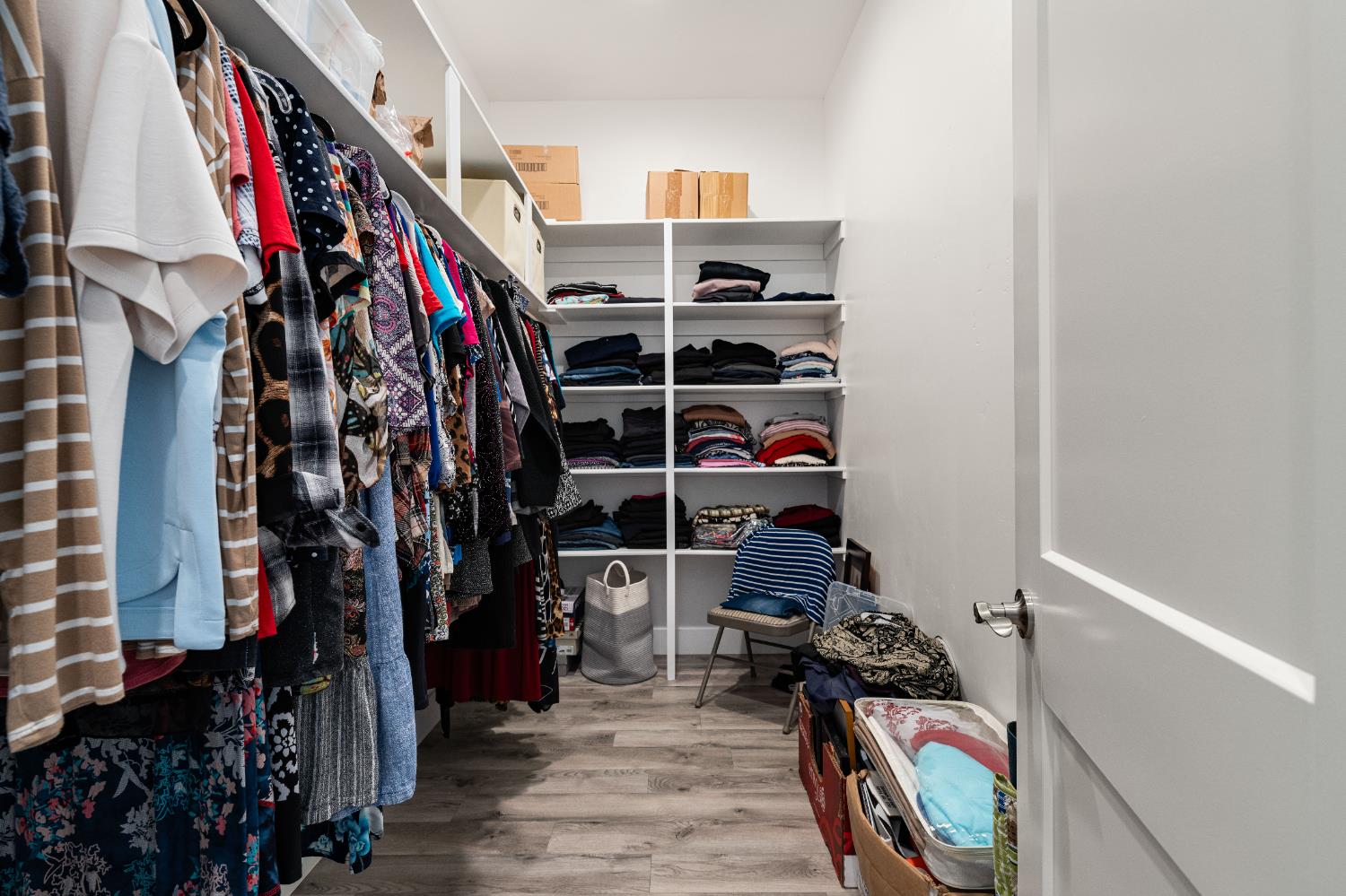 3629 Chelsea Road Cameron Park, CA 95682 - Photo 25 of 44 a view of walk in closet with clothes and shoes