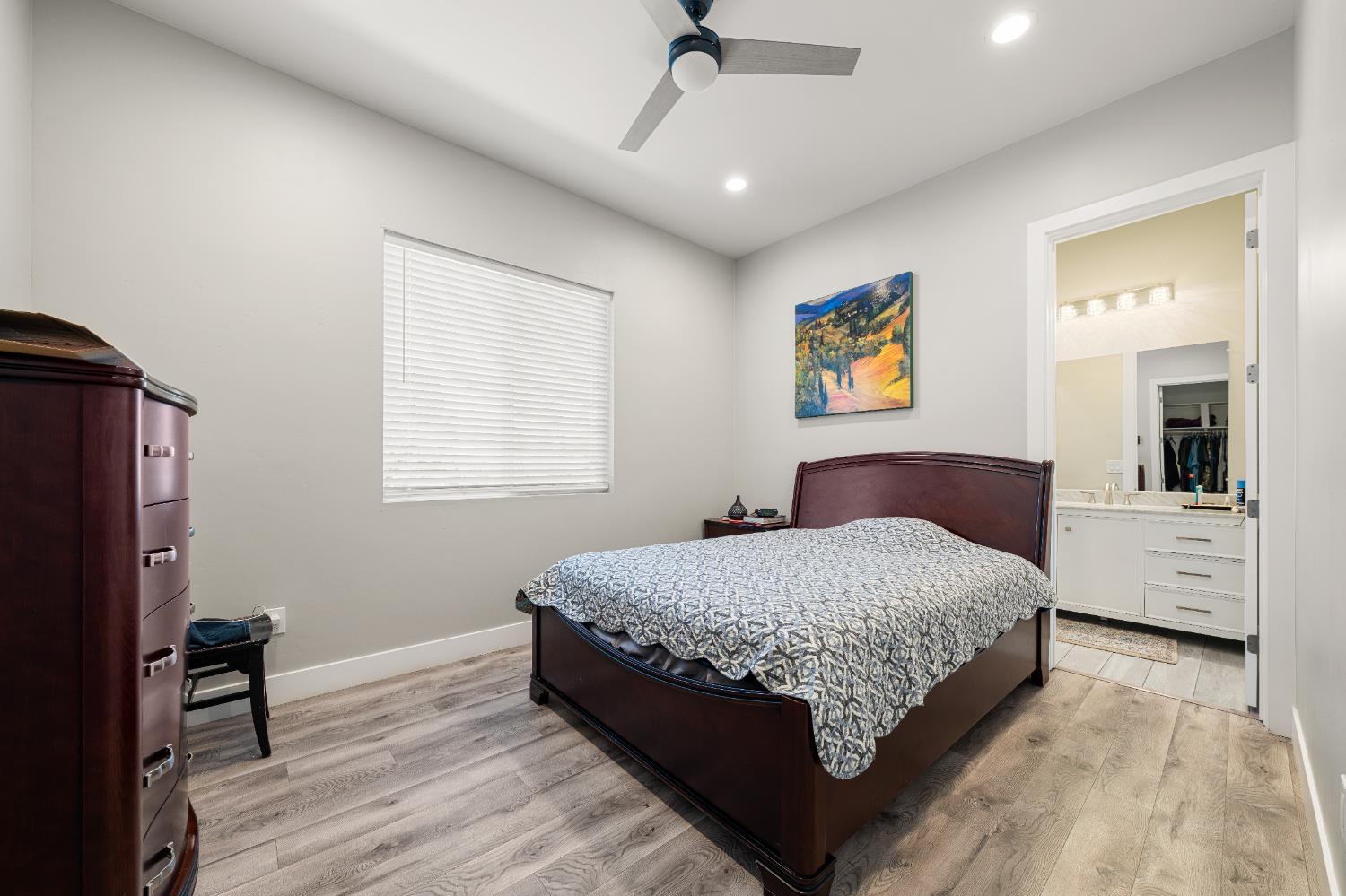 3629 Chelsea Road Cameron Park, CA 95682 - Photo 28 of 44 a bedroom with a large bed and a window