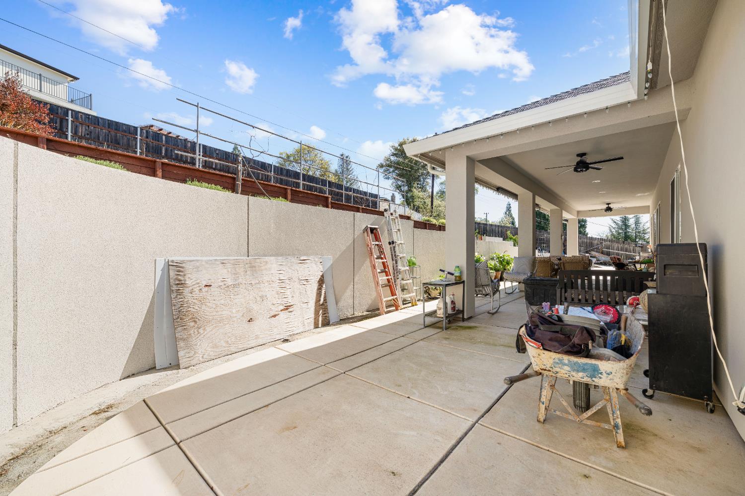 3629 Chelsea Road Cameron Park, CA 95682 - Photo 35 of 44 a garage with table and chairs
