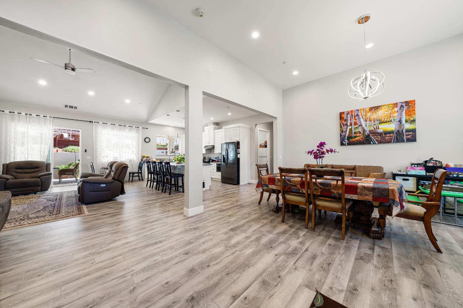 3629 Chelsea Road Cameron Park, CA 95682 - Photo 5 of 44 a living room with lots of furniture and a wooden floor