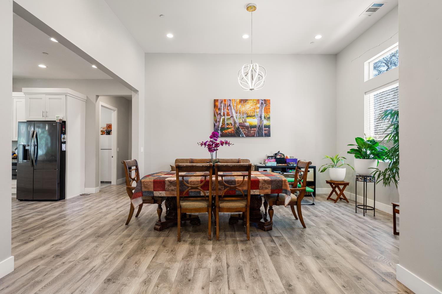 3629 Chelsea Road Cameron Park, CA 95682 - Photo 6 of 44 a view of a dining room with furniture and wooden floor
