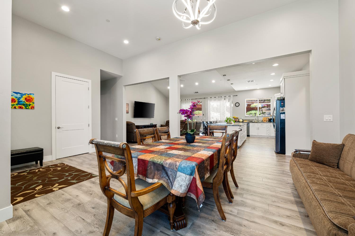 3629 Chelsea Road Cameron Park, CA 95682 - Photo 7 of 44 a dining room with furniture and wooden floor