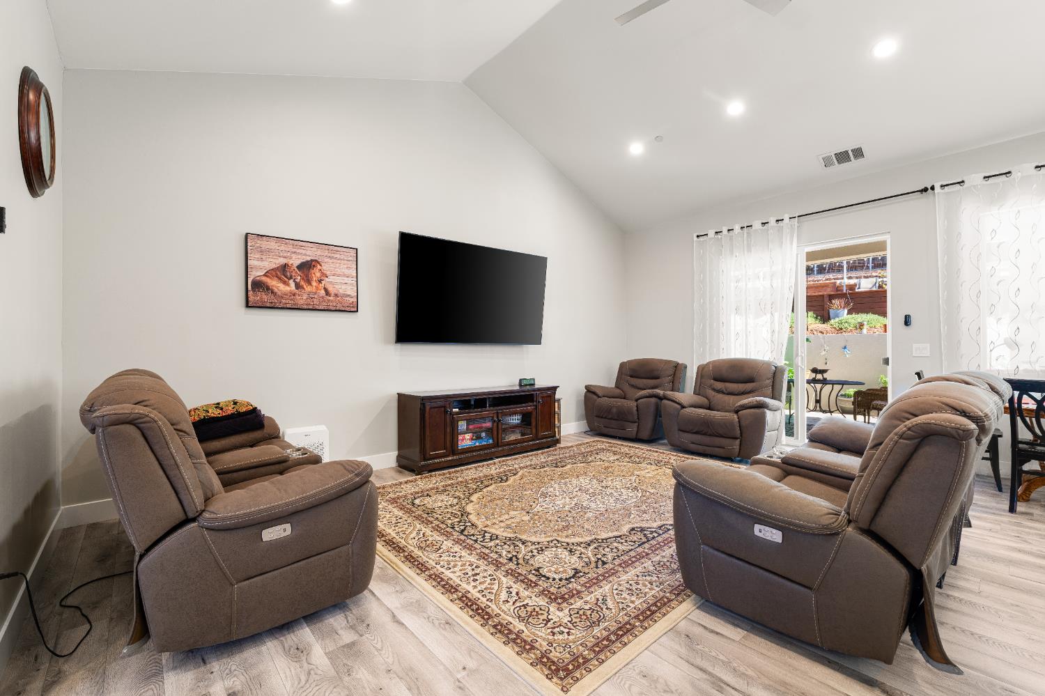 3629 Chelsea Road Cameron Park, CA 95682 - Photo 8 of 44 a living room with furniture or couch and a flat screen tv