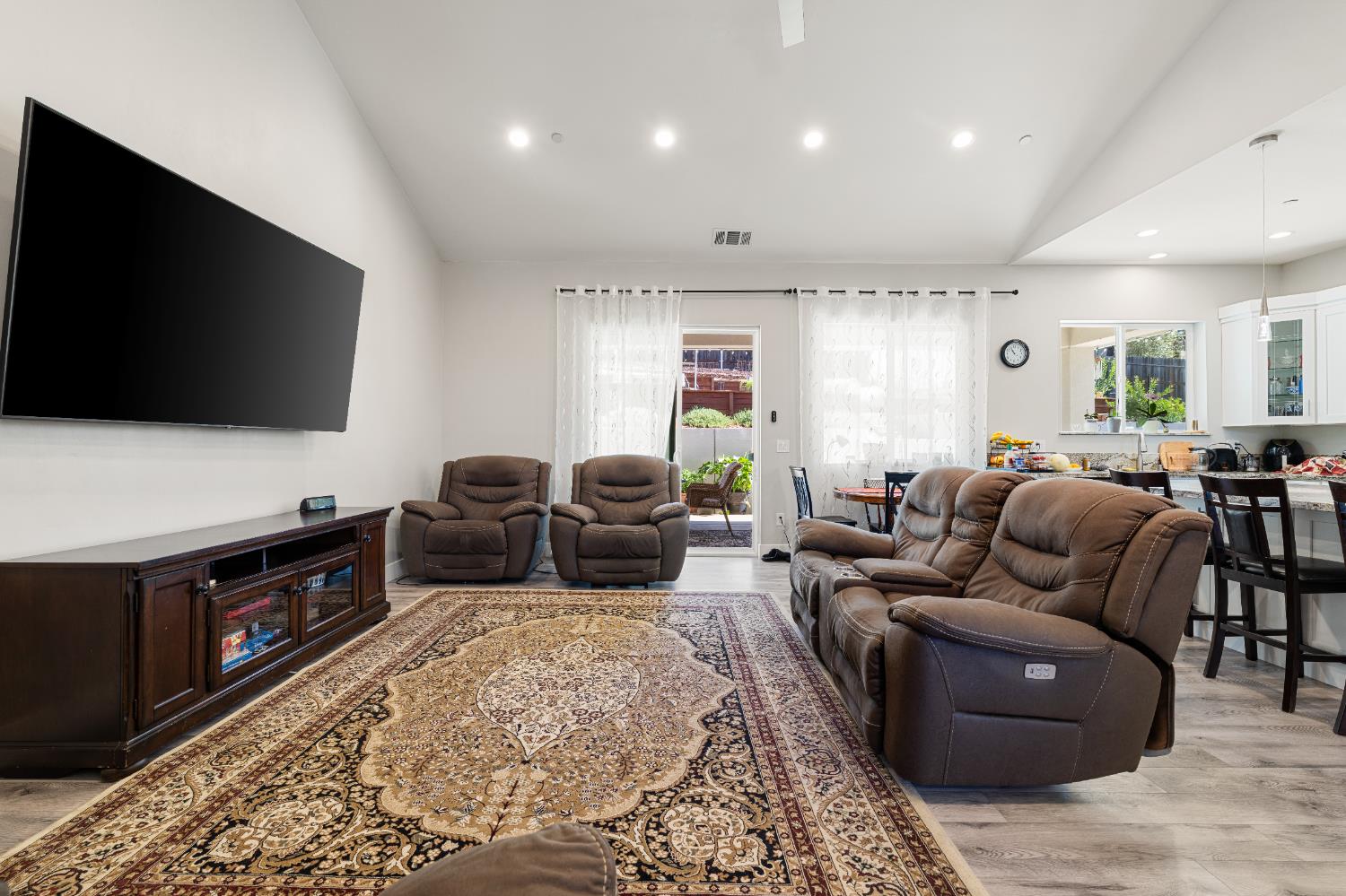 3629 Chelsea Road Cameron Park, CA 95682 - Photo 9 of 44 a living room with furniture and a flat screen tv