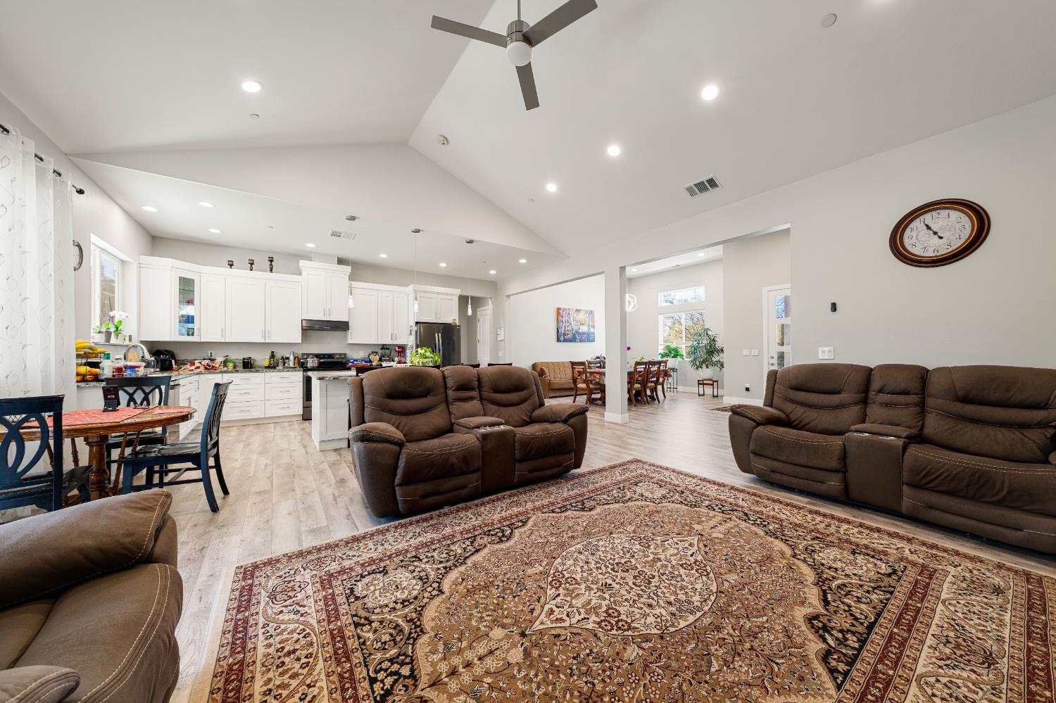 3629 Chelsea Road Cameron Park, CA 95682 - Photo 10 of 44 a living room with furniture ceiling fan and a rug