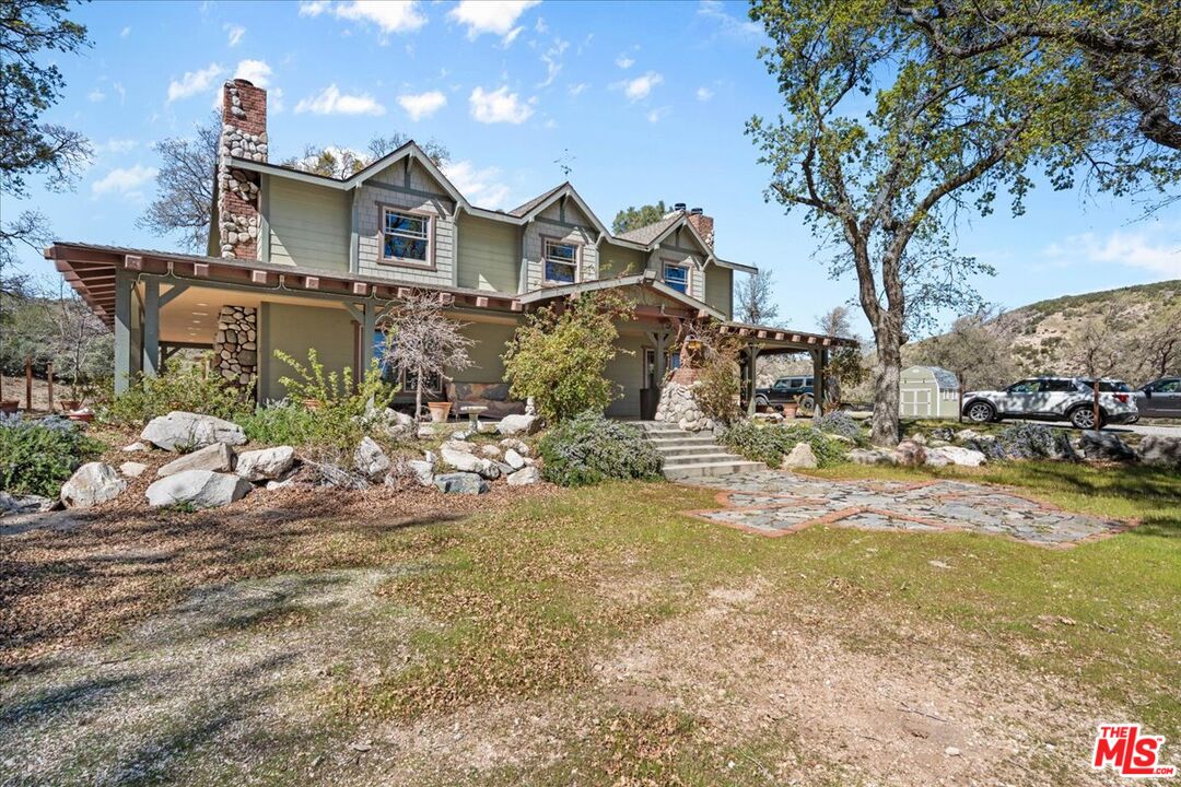 28200 Pine Canyon Road Lake Hughes, CA 93532 - Photo 4 of 52 a view of a house with a yard