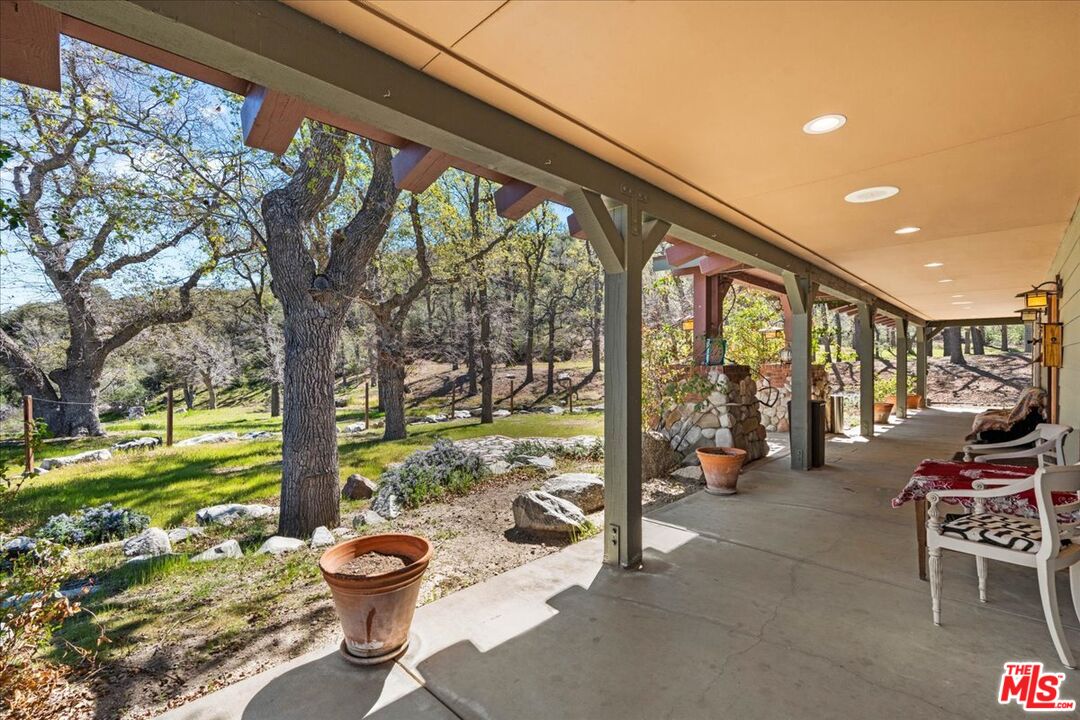 28200 Pine Canyon Road Lake Hughes, CA 93532 - Photo 5 of 52 a outdoor space with lots of furniture and garden
