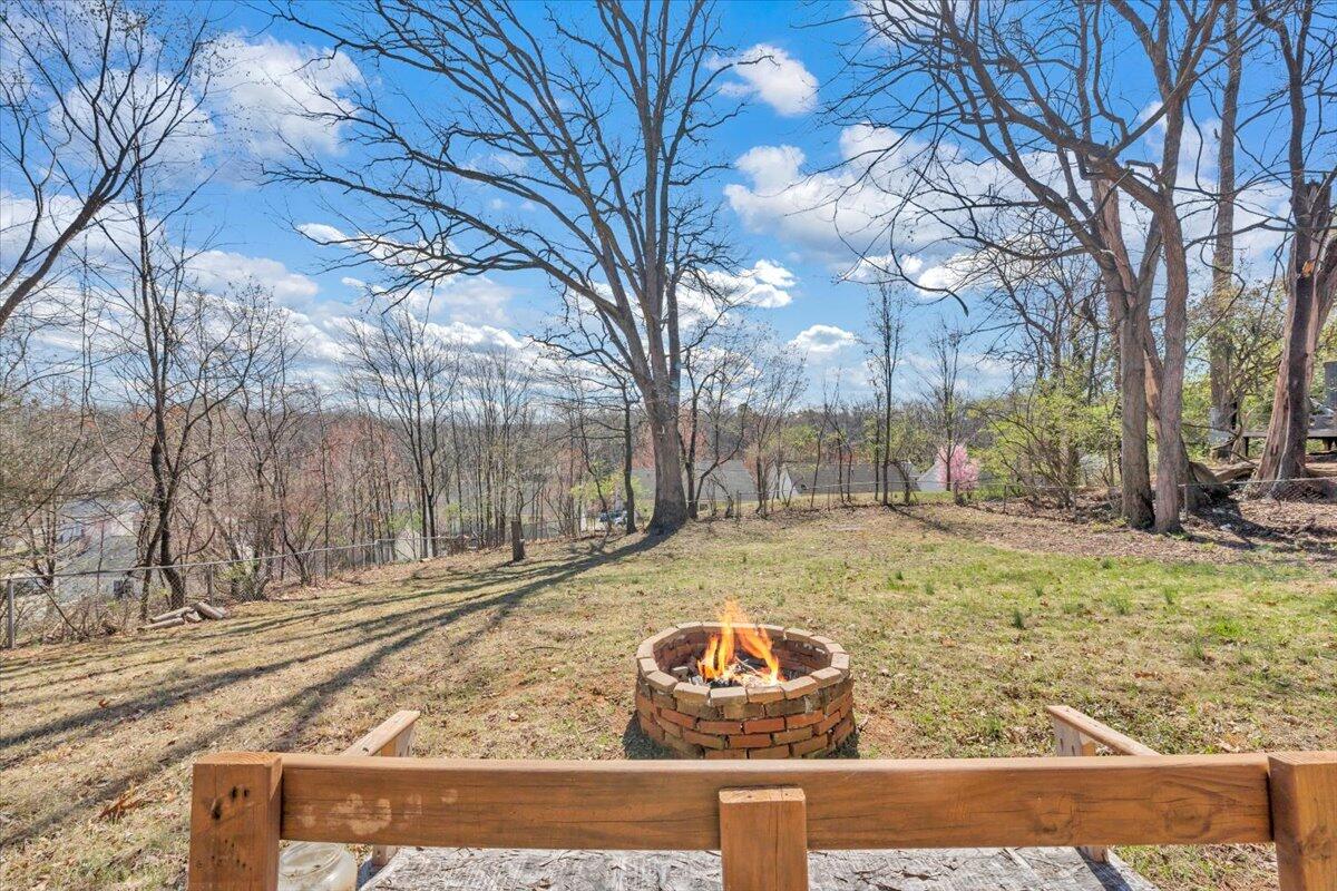 4644 Desi Road Northwest Roanoke, VA 24017 - Photo 2 of 24 a view of a yard with wooden fence