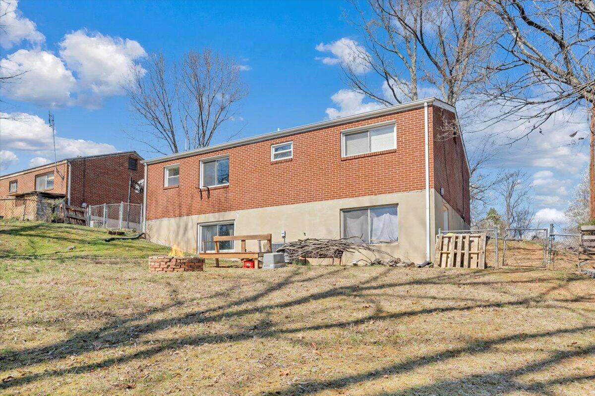 4644 Desi Road Northwest Roanoke, VA 24017 - Photo 23 of 24 a view of a house with a yard