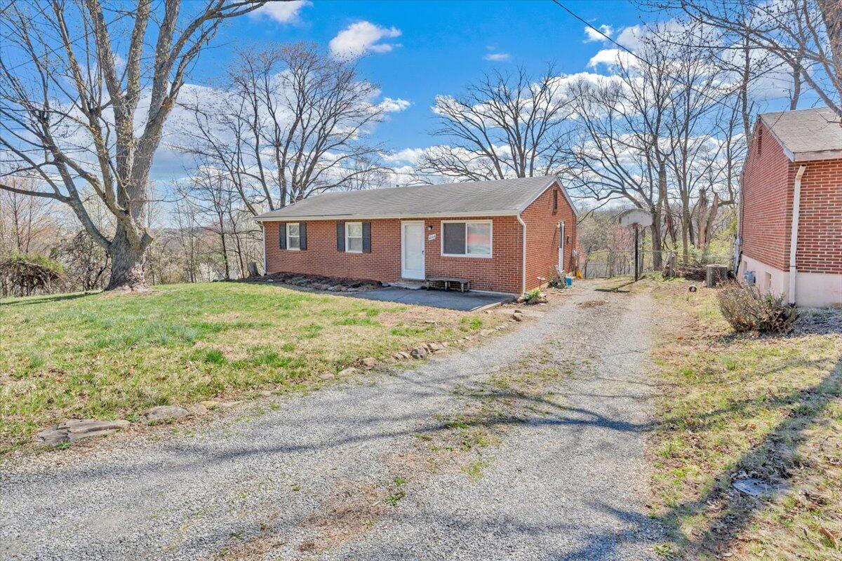 4644 Desi Road Northwest Roanoke, VA 24017 - Photo 24 of 24 a view of a yard with a house