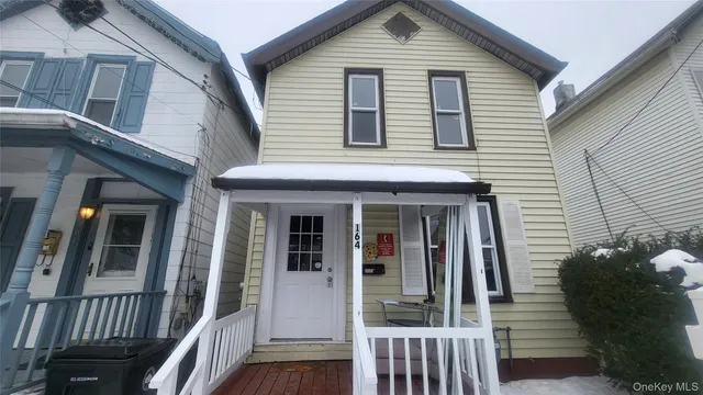 a view of a house with a porch