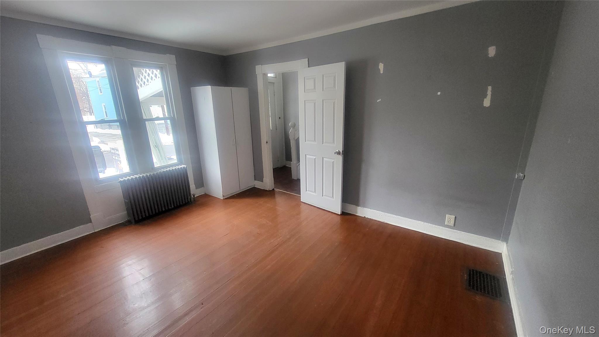 164 Thompson Street Poughkeepsie, NY 12601 - Photo 7 of 17 Entry from front door into living room