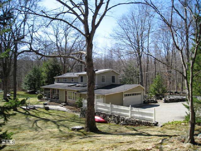 30 Topstone Road Ridgefield, CT 06877 - Photo 1 of 1 a view of a house with yard and sitting area