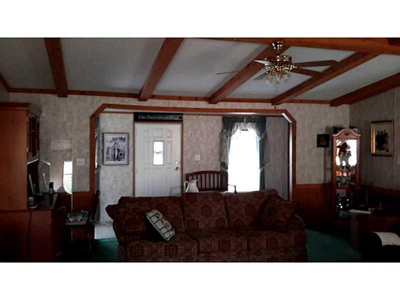 350 Transalpine Road Lincoln, ME 04457 - Photo 16 of 27 Living Room. front door entry