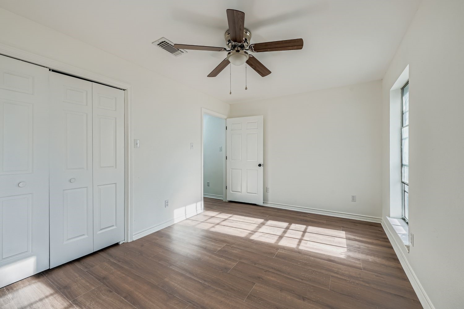 34411 Fulshear Farms Road Fulshear, TX 77441 - Photo 20 of 29 a view of empty room with wooden floor