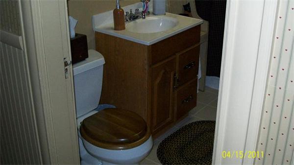 364-366 Main Street Springfield, MA 01151 - Photo 7 of 7 a bathroom with a sink and a toilet