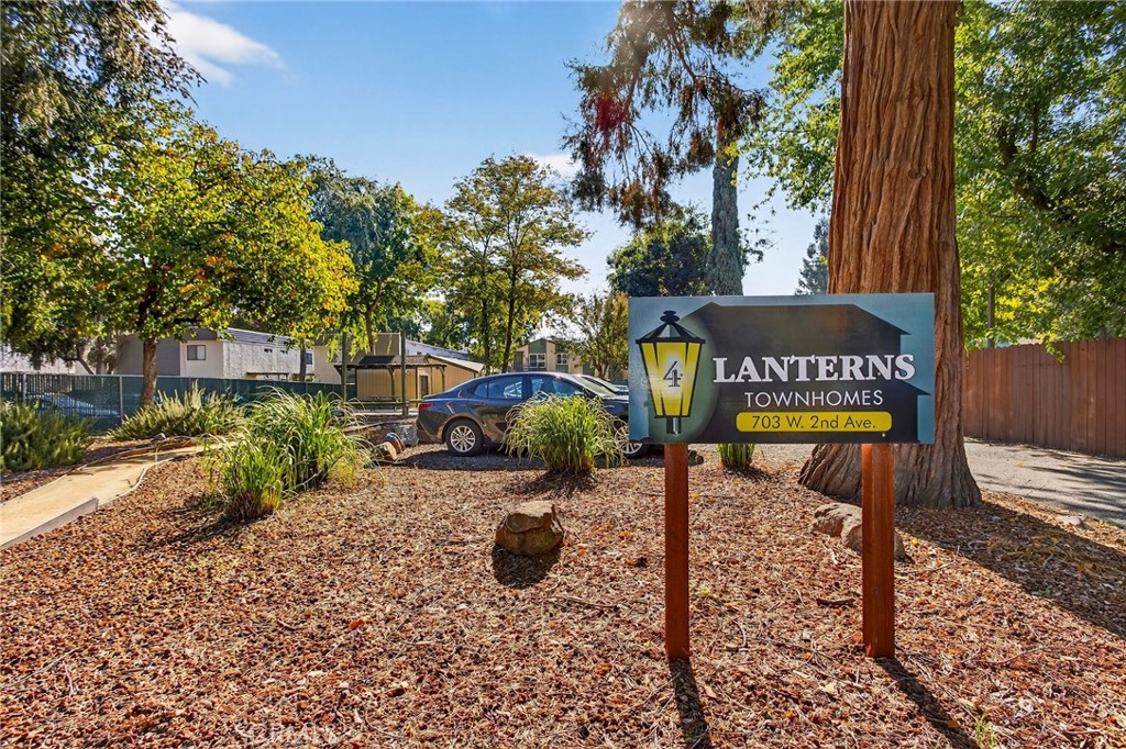 703 West 2nd Avenue Chico, CA 95926 - Photo 2 of 27 a view of a park with iron fence