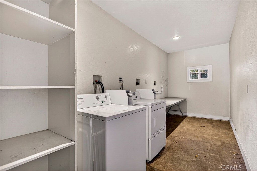 703 West 2nd Avenue Chico, CA 95926 - Photo 23 of 27 a room with sink and washing machine