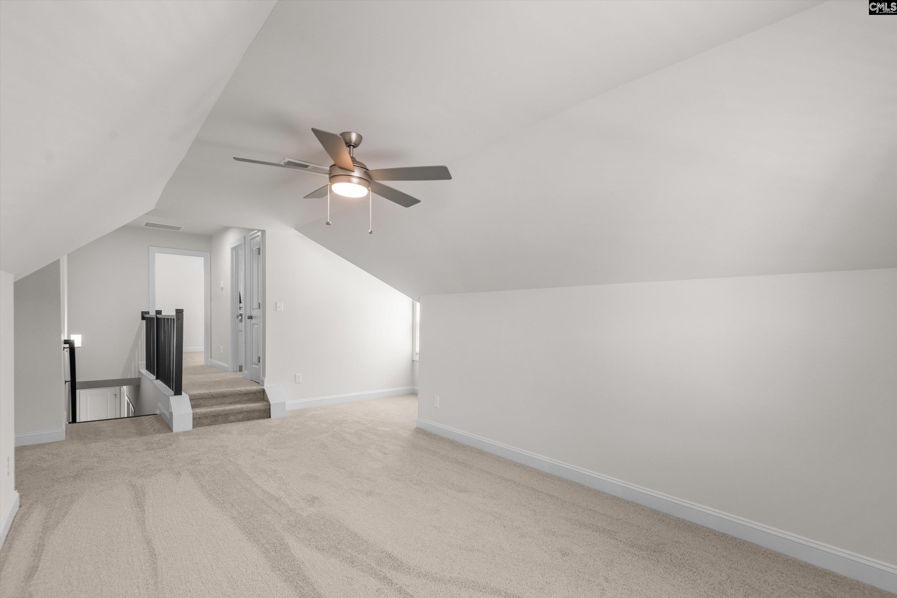 558 Wild Ginger Loop Irmo, SC 29063 - Photo 35 of 42 a view of a livingroom with a ceiling fan and window