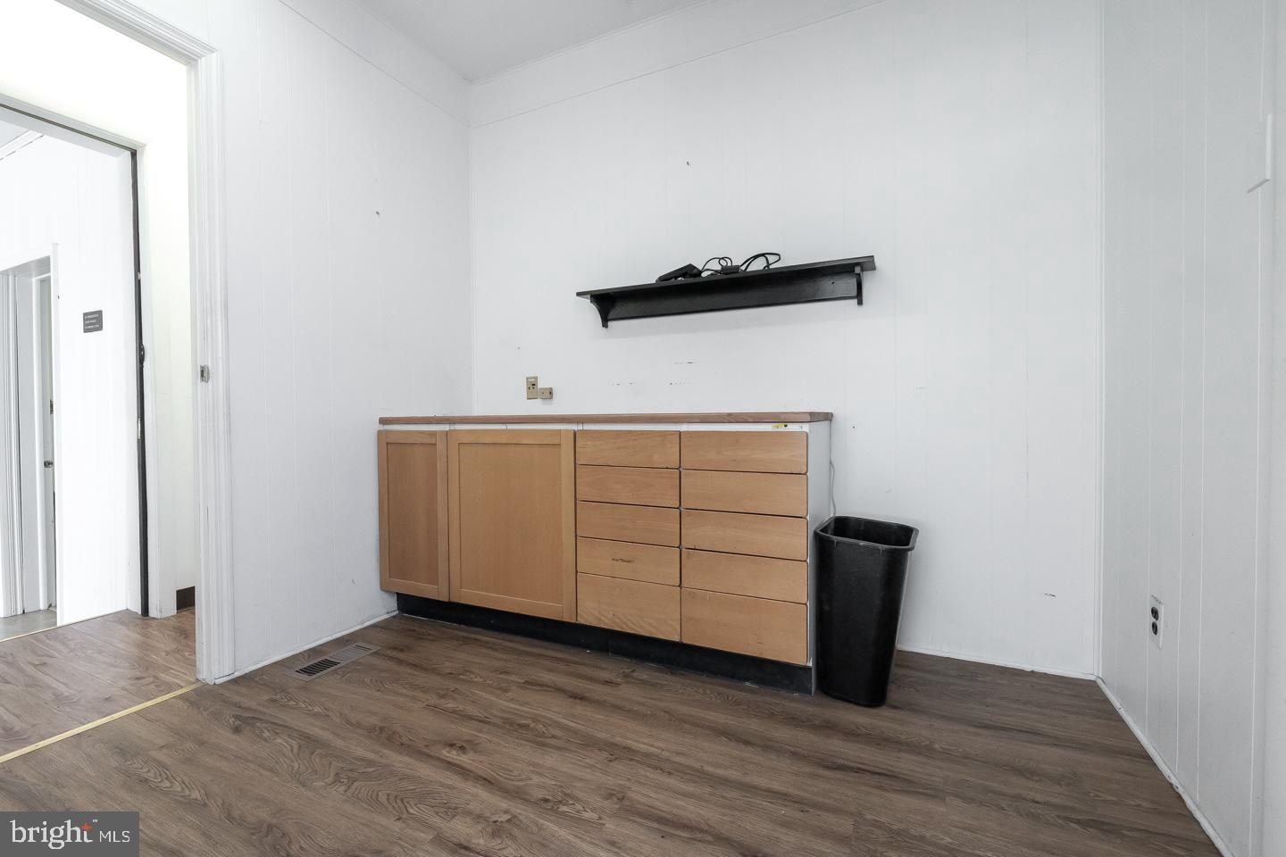 1017 Market Street Gloucester City, NJ 08030 - Photo 12 of 40 a view of a utility room with wooden floor
