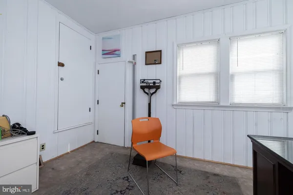 a room with furniture and windows