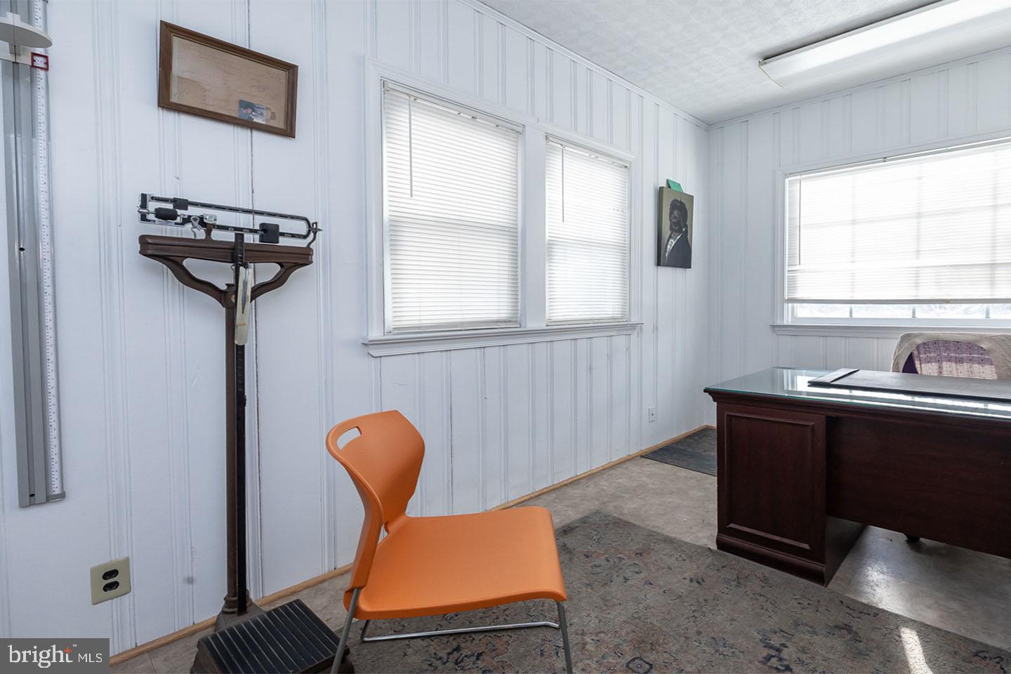 1017 Market Street Gloucester City, NJ 08030 - Photo 15 of 40 a room with furniture and windows