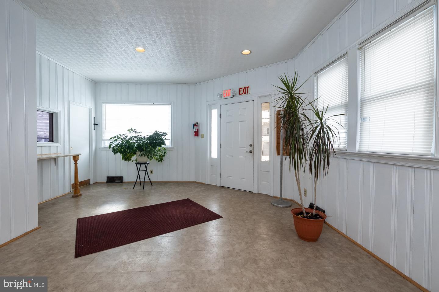 1017 Market Street Gloucester City, NJ 08030 - Photo 2 of 40 a living room with furniture and a potted plant
