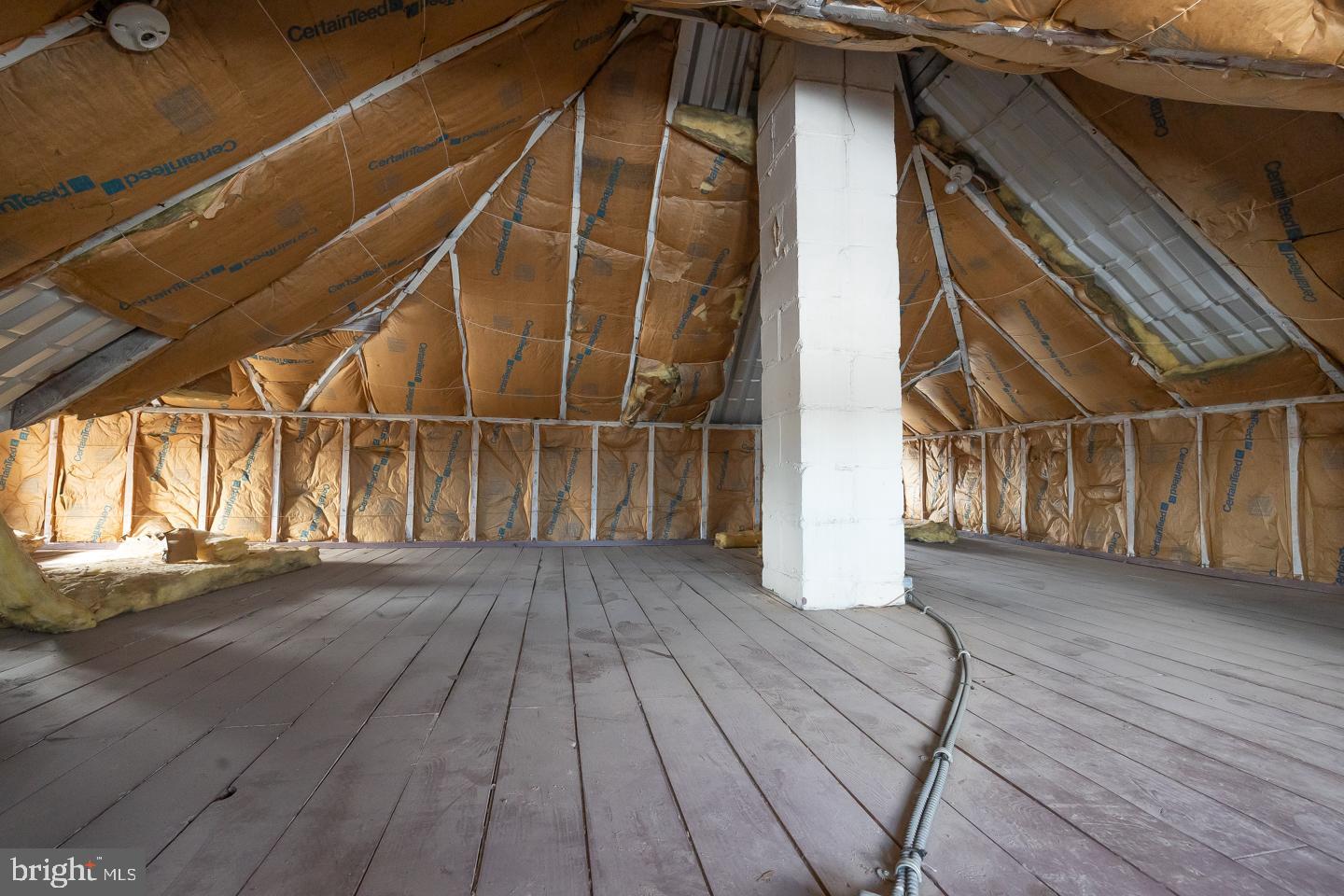 1017 Market Street Gloucester City, NJ 08030 - Photo 28 of 40 a view of an empty room with wooden floor