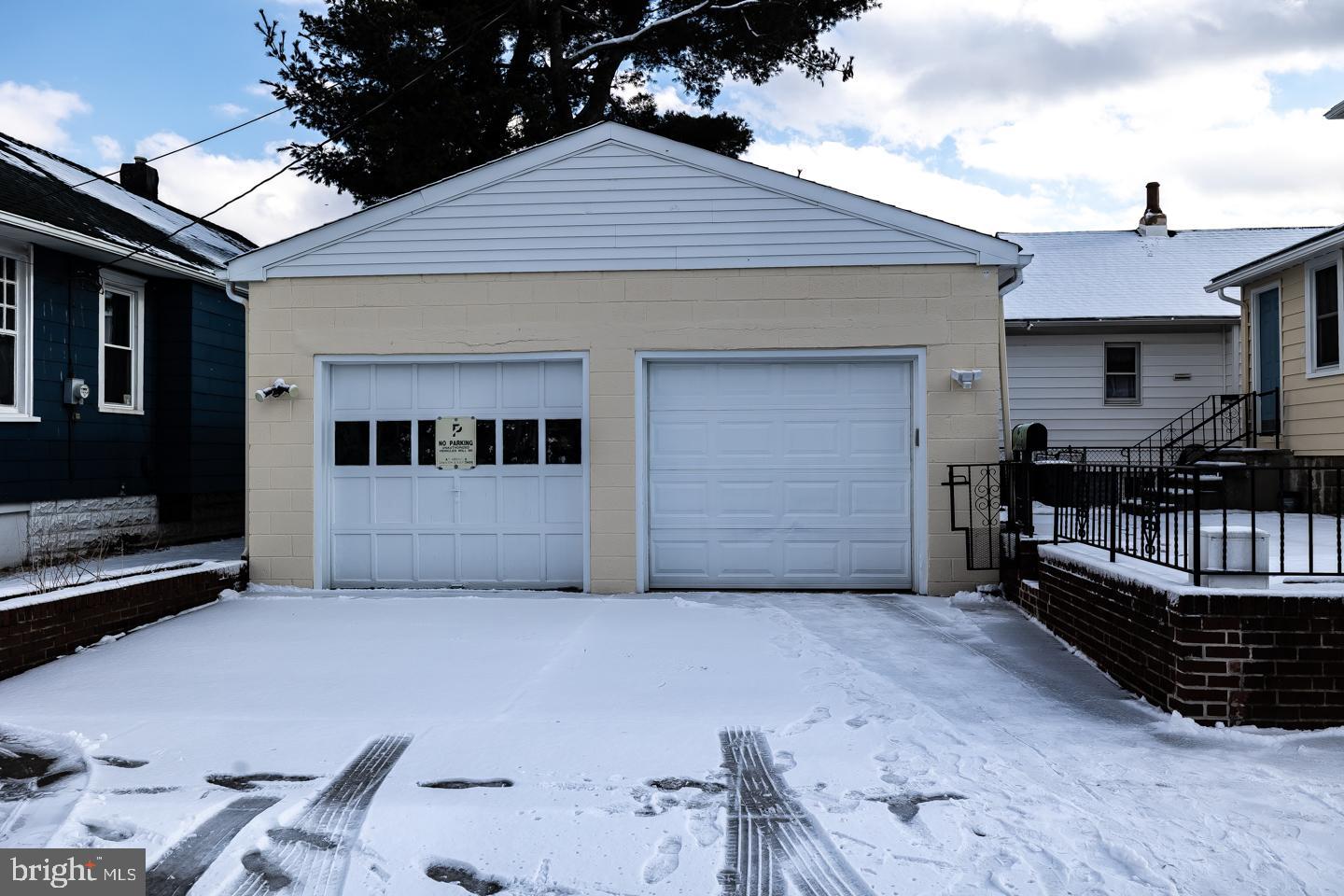 1017 Market Street Gloucester City, NJ 08030 - Photo 32 of 40 a front view of house with garage