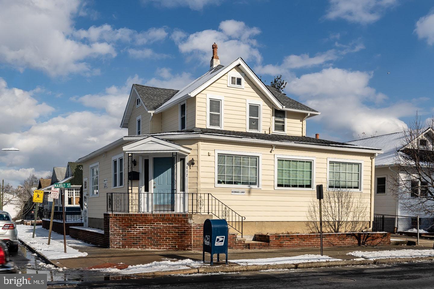 1017 Market Street Gloucester City, NJ 08030 - Photo 37 of 40 a front view of a house with yard