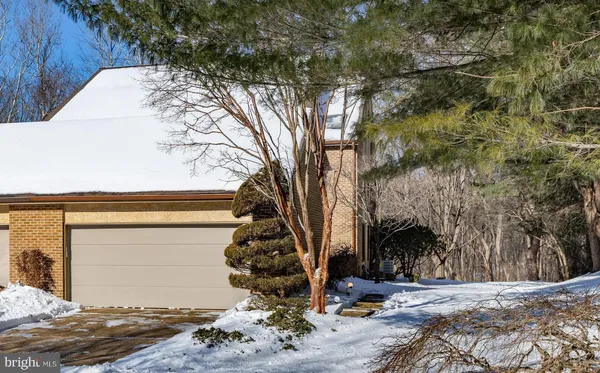 a view of a house with a snow