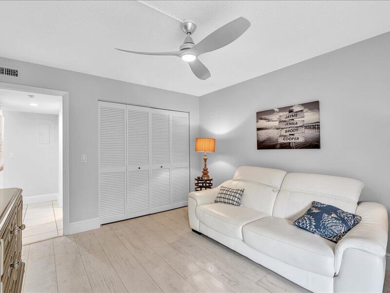 277 North Ocean Boulevard, Unit 102 Boca Raton, FL 33432 - Photo 30 of 53 a living room with furniture