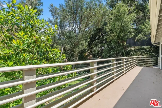 a view of balcony with mountain view
